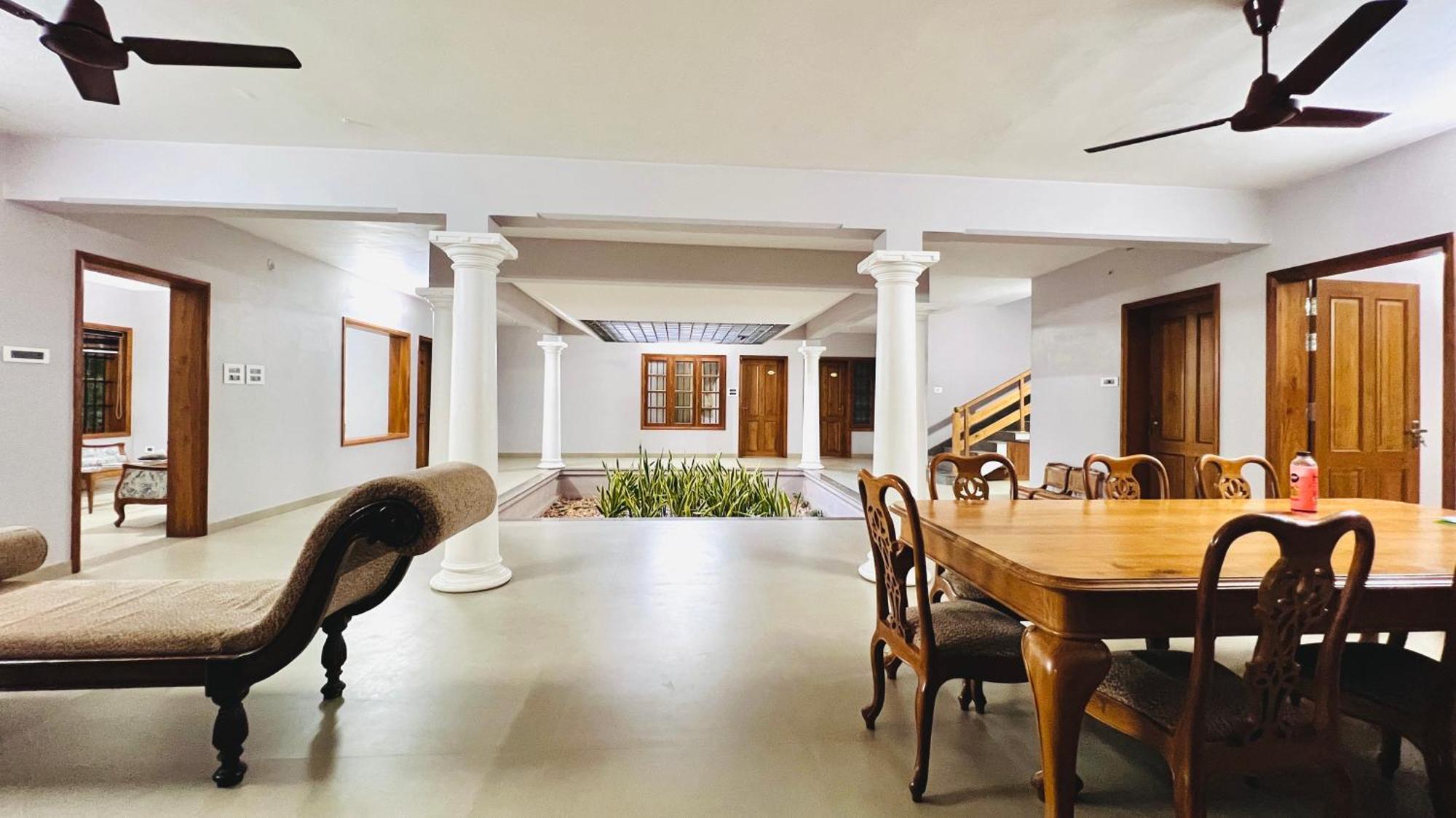 Waterfront By Palmyra Apartment Kollam Exterior foto